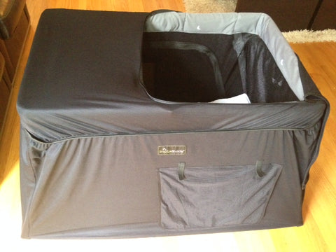 SnoozeShade on a Guava Lotus travel crib